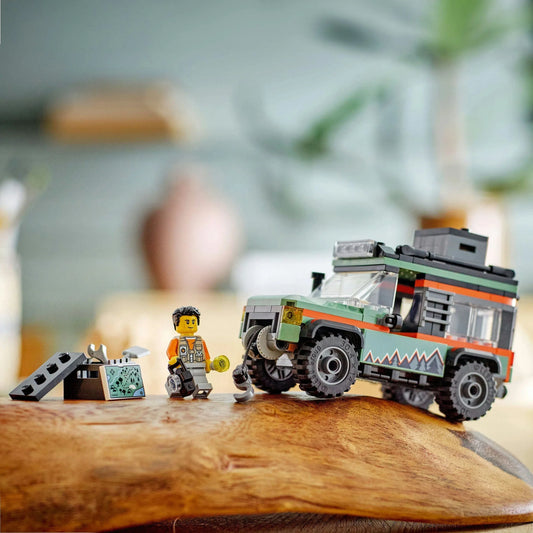 Curious Minds Toys & Games > Toys > Construction Toys > Interlocking Blocks > LEGO > LEGO City Lego City 60447 Off-Road 4x4 Mountain Truck Playset for Ages 6 and Up