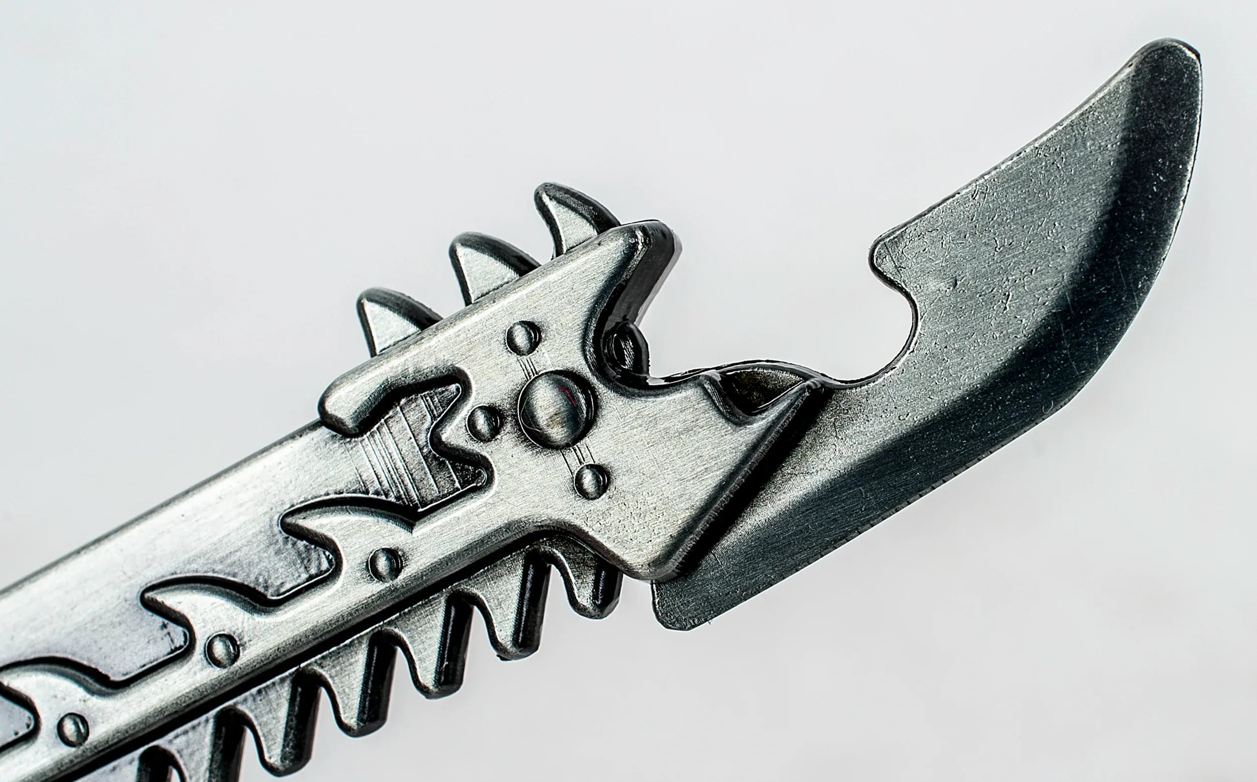 Loaded Dice Collectibles Warhammer 40,000: Chaos Chainsword Bottle Opener